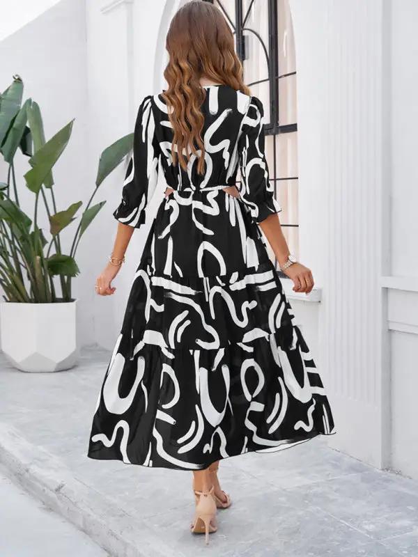 Spring and summer new holiday casual printed V-neck slit dress